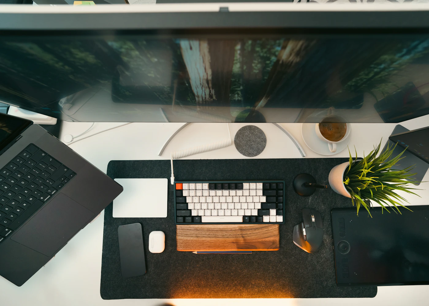 A carefully organized desk viewed from above
